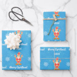 Feuille De Papier Cadeau Christmas Gingerbread Brown Père Noël Personnalise<br><div class="desc">Enveloppe cadeau de Noël moderne pour les enfants,  avec un design minimaliste qui comprend une figure en pain d'épices de Père Noël,  des flocons de neige,  le salut "Joyeux Noël" dans la typographie stylisée,  et un nom personnalisé. Sur un arrière - plan bleu avec des flocons de neige.</div>