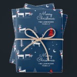 Feuille De Papier Cadeau Christmas Reindeer Nom de famille<br><div class="desc">Ce papier d'emballage de Noël Reindeer Family Name est une jolie scène illustrée de cerfs,  d'arbres et de flocons de neige au-dessus d'un arrière - plan bleu marine. Personnalisez-le : adressez-le à votre proche ou ajoutez votre nom de famille.</div>