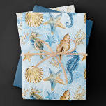 Feuille De Papier Cadeau Coastal Chic | Moderne Bleu et Or sous la mer<br><div class="desc">Le design de la plage "sous la mer", peint à la main en bleu poussiéreux et or, apporte une touche moderne à un vieux thème. La collection présente des coquillages, des étoiles de mer, un hippocampe et un récif corallien complétant les tons bleu, or et blanc cassé avec une pointe...</div>