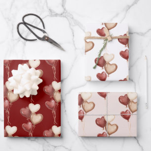 Feuille De Papier Cadeau Cœurs Ballons Rouge Crème Amour dans l'air