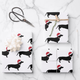 Feuille De Papier Cadeau Dachshund De Noël À Travers La Neige