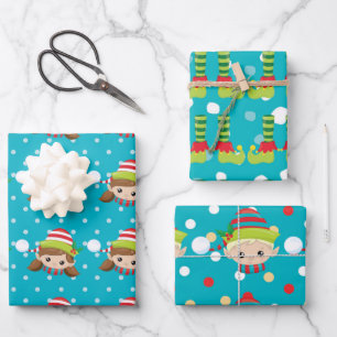 Feuille De Papier Cadeau Elf garçon fille face pieds sur le bleu avec la n