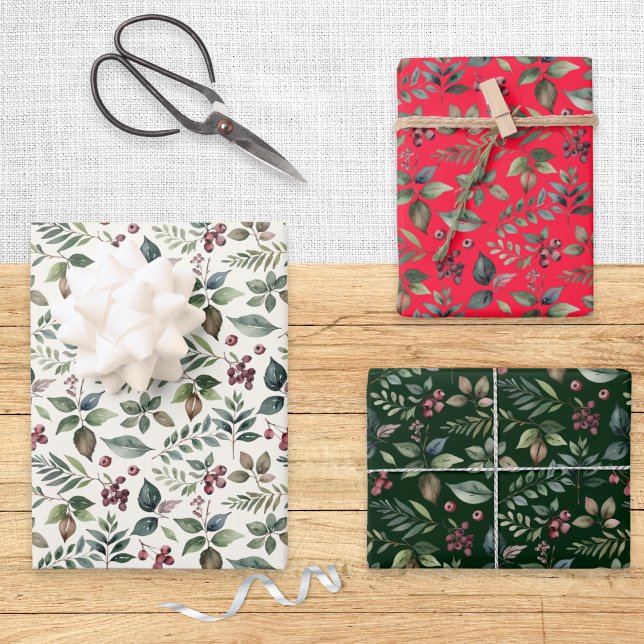 Feuille De Papier Cadeau Festive botanique verdure et baies Noël (An elegant set of Christmas gift wrap sheets in red, winter white and green, with botanical pattern)