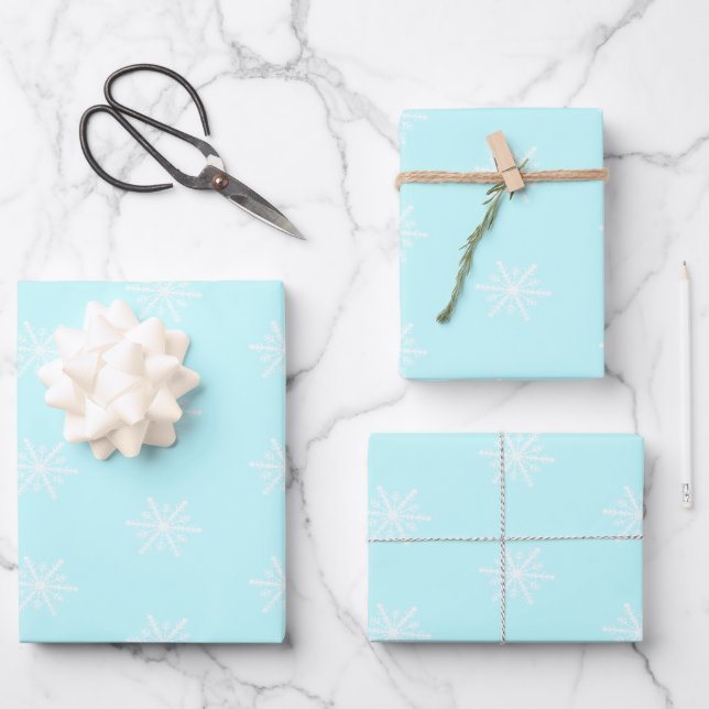 Feuille De Papier Cadeau Fête motif de Noël bleu glacé (Recto)