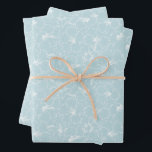 Feuille De Papier Cadeau Floral blanc sur bleu<br><div class="desc">Trois feuilles de papier d'emballage présentent un contour de fleurs d'hibiscus blanc tropical sur un arrière - plan bleu pâle (ou toute couleur que vous choisissez). Joli emballage cadeau pour anniversaire,  mariage,  anniversaire,  ou toute occasion. PLUS de couleurs dans notre magasin.</div>