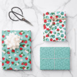 Feuille De Papier Cadeau Fraises Rouges Fleurs Blanches Motif Bleu Douce<br><div class="desc">Feuilles de papier d'emballage thématiques fraise rouge et bleu avec trois motifs de fraise assortis : une feuille avec des fraises rouges, des feuilles et des fleurs blanches sur fond bleu, une feuille avec beaucoup de fraises en rouge et nuances de bleu et de sarcelle, et une feuille turquoise avec...</div>