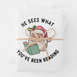 Feuille De Papier Cadeau Il voit ce que vous avez lu Livre de Noël livresqu