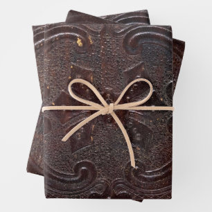 Feuille De Papier Cadeau Livre en cuir ancien déchu