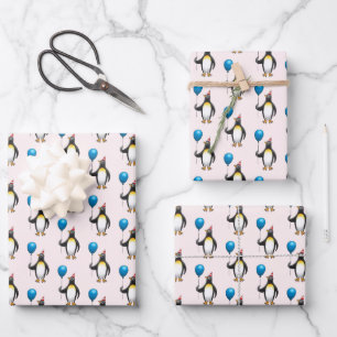 Feuille De Papier Cadeau Manchot avec un ballon bleu