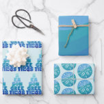Feuille De Papier Cadeau Mer De Plage Et Salutations<br><div class="desc">Fun beachy Season Salutations enveloppant papier dans une conception de typographie fantasque dans des tons de bleu océan avec des accents de dollar de sable et de poisson. Veuillez contacter le concepteur par le bouton MESSAGE ou par courriel à sillyseasshop@gmail.com si vous avez besoin d'aide pour la conception, les produits...</div>