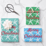 Feuille De Papier Cadeau Merry Christmas Starfish Multicolor Nautical Cute<br><div class="desc">Conçu avec des motifs d'étoiles de mer et message "Joyeux Noël" en arrière - plans multicolores de turquoise,  bleu et vert! Vous pouvez changer les couleurs comme vous voulez!</div>