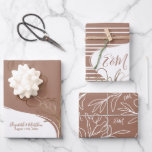 Feuille De Papier Cadeau Monogramme personnalisé Mocha Brown Mariage floral<br><div class="desc">Papier d'emballage Mocha brun abstrait fleuri personnalisé fiançailles, mariage ou nuptiale avec fleurs dorées. Ajoutez votre propre texte avec l'outil d'édition Zazzle facile à utiliser! Design moderne dans des tons neutres. VEUILLEZ NOTER : Les détails dorés sont des imitations. Aucune feuille utilisée. Visitez le magasin pour voir toute la collection....</div>