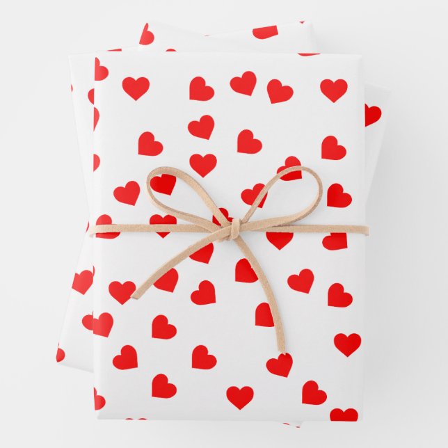 Feuille De Papier Cadeau Motif de coeur rouge romantique jouant (En situation)
