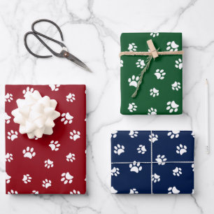 Feuille De Papier Cadeau Motif Empreintes de Patte Blanches sur Rouge Vert