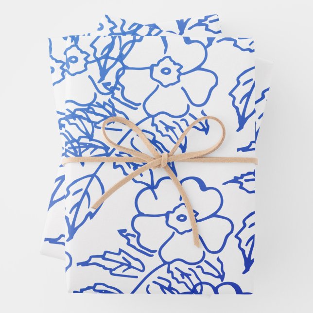 Feuille De Papier Cadeau motif vintage de fleurs bleues sur blanc (En situation)