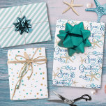 Feuille De Papier Cadeau Script Joyeuses Fêtes de Noël côtier<br><div class="desc">Noël côtier tropical saluant les Joyeuses Fêtes dans un design de typographie de script décoratif avec des étoiles de mer sur une feuille, coordonnant des points turquoise et or sur une feuille et coordonnant des rayures turquoise sur une autre pour un trio de giftwrap sur le thème de la plage...</div>
