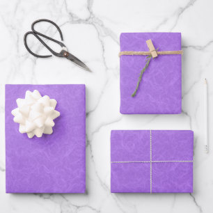 Feuille De Papier Cadeau Surface violette texturée avec motif tourbillonnan