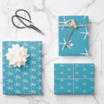 Feuille De Papier Cadeau Tropical Blue Christmas Starfish in Ornamers<br><div class="desc">Feuille de papier d'emballage bleu tropical de Noël. Trois motifs de différentes tailles,  utilisant des étoiles de mer blanches et de petits ornements de boules d'argent,  couvrent des feuilles roulées de papier d'emballage.</div>