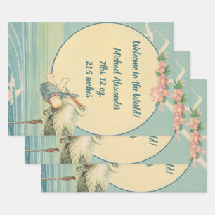 Feuille De Papier Cadeau Vintage cigogne portant bébé garçon dans une couve