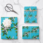 Feuille De Papier Cadeau White Starfish<br><div class="desc">Starfish and holly aqua blue christmas wrapping paper sheets. A contemporain design uses toxiques from the sea to create unique wrapping paper. White sea stars, green holly and red berries make various patterns on a pretty, tropical blue color. Each sheet veut wrap one large present, ou cut to use for...</div>