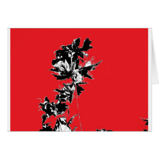 Feuille noir sur l'arrière - plan rouge