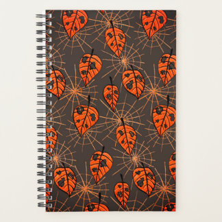 Feuilles d'automne d'Halloween et toiles d'araigné