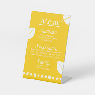 Feuilles d'automne sur le panneau du piédestal jau