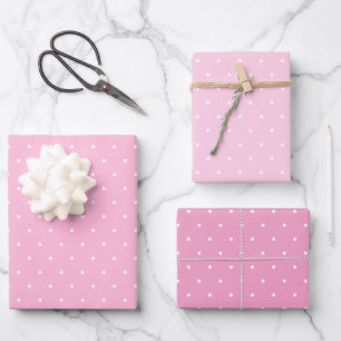 Feuilles de papier à trois roses enrobées pois