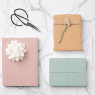 Feuilles de papier cadeau rose pastel orange vert