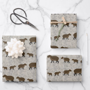Feuilles de papier capybara enveloppant
