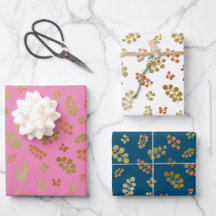 Feuilles de papier enveloppant cadeau de Noël de b