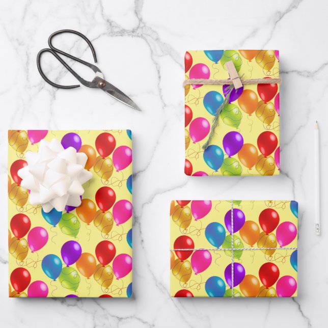 Feuilles de papier enveloppant les ballons d'anniv (Recto)