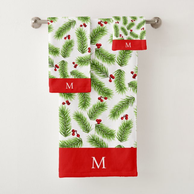 Feuilles de pin de Noël et baies sur Monogramme (En situation)