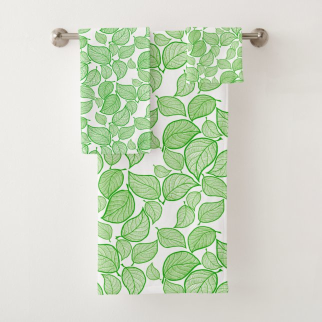 Feuilles verts sur la serviette blanche (En situation)