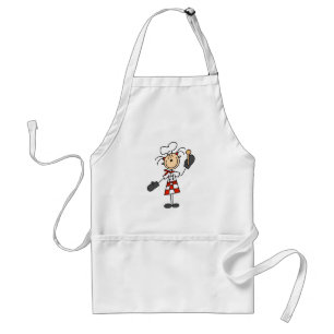 Fille de chef avec le tablier en bois de cuillère