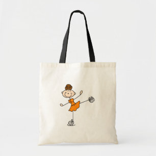 Fille de patinage de glace dans le sac orange