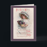 Fille vintage de Pâques en Bonnet Carte de voeux<br><div class="desc">Carte de Pâques Ellen Clapsaddle signée vintage avec une jolie petite fille portant un très grand Bonnet de Pâques victorien tenant un panier de Pâques plein de fleurs et un accueil de Pâques à l'ancienne.</div>