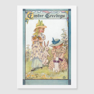 Filles de campagne vintages avec lapins de Pâques 