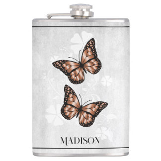 Flacon de fleurs de papillon de cuivre