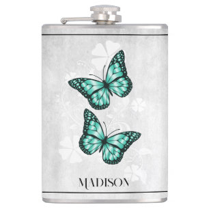 Flacon turquoise papillon
