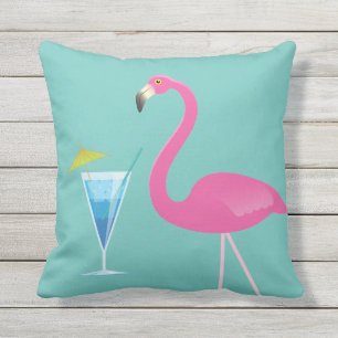 Flamant rose et cocktail sur le coussin extérieur