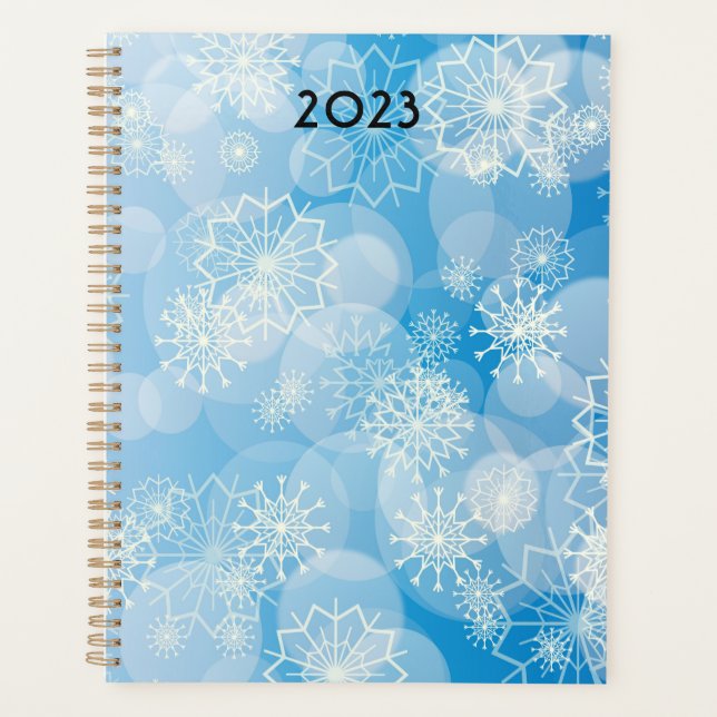 Flammes de neige de Noël sur un arrière - plan ble (Devant)