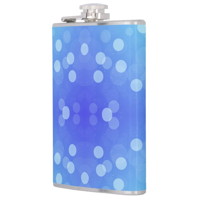 Flasques A metal flask featuring a vibrant blue background  (Gauche)