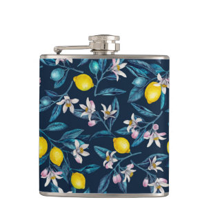 Flasques Branches de citron avec fleurs et fruits sur le bl