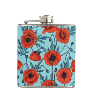 Flasques Poppies, rouge et bleu sur le bleu de la piscine