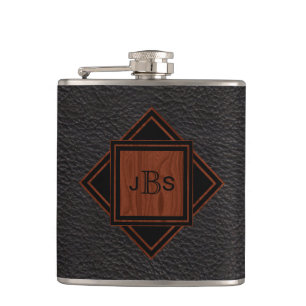 Flasques Regard du bois   en cuir décoré d'un monogramme