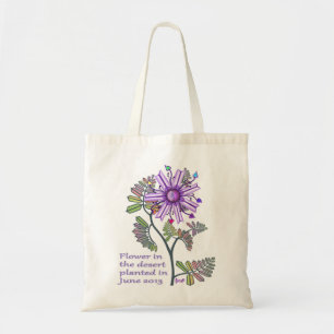 Fleur dans le sac fourre-tout du désert