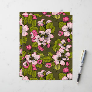 Fleur de pomme sur vert foncé
