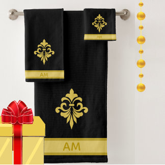 Fleur dorée élégante, monogramme et rayure sur fon
