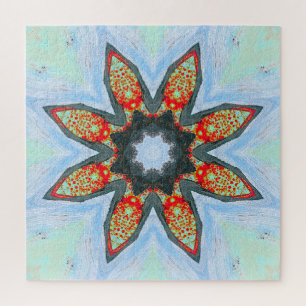 Fleur rouge orange étoile sur Puzzle bleu